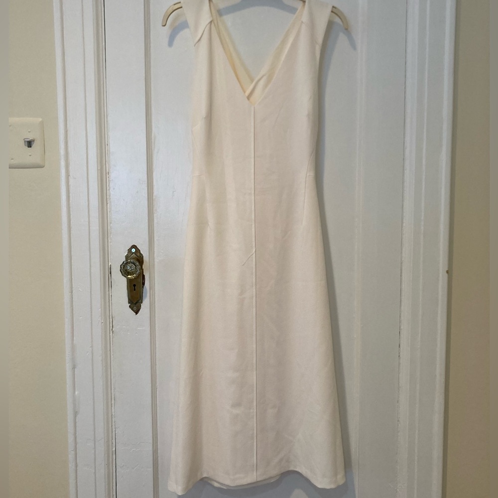 Club Monaco size 14 off white dress with cross straps in the back